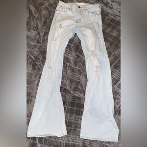 Light wash ripped flare jeans size 3